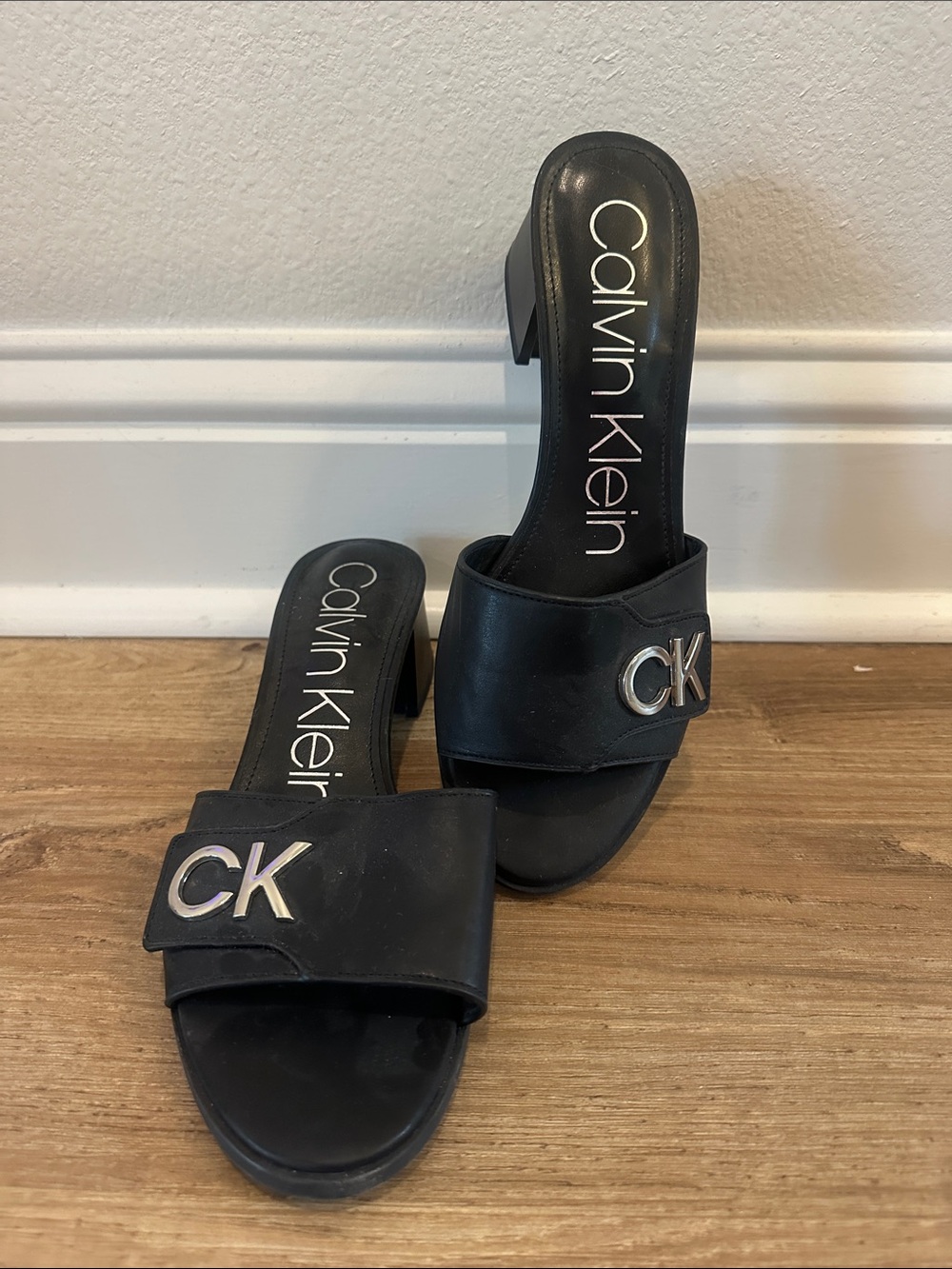 Calvin Klein Black Logo Slide Mules with Silver CK Accent